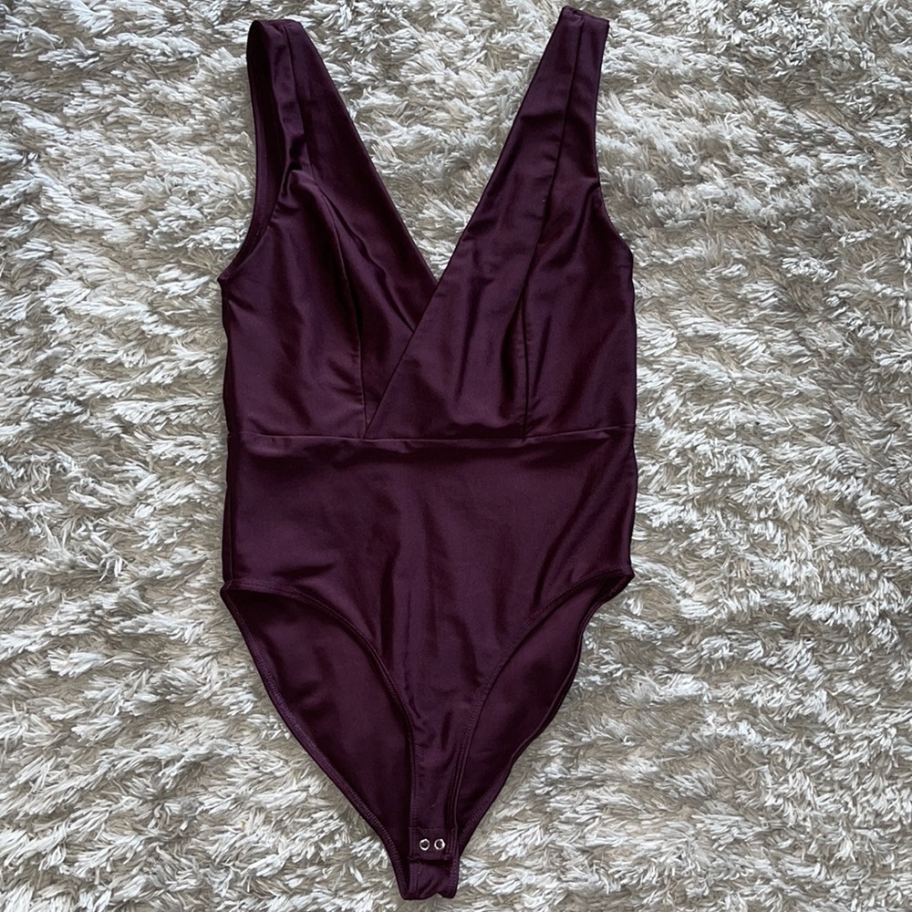 Purple body suit